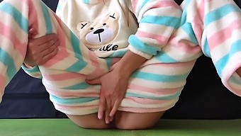 Young Woman In Sleepwear Pleasures Herself And Experiences Female Ejaculation